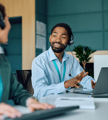 Businessman collaborating with coworker